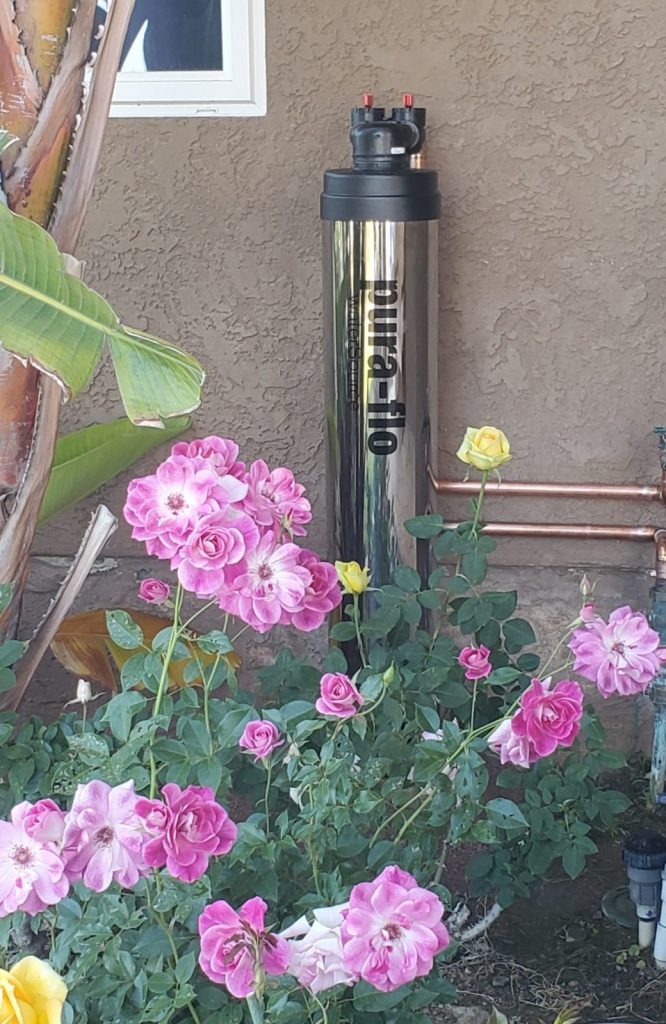Pura-Flo descalePLUS™ whole-house salt-free water conditioner installed outdoors
